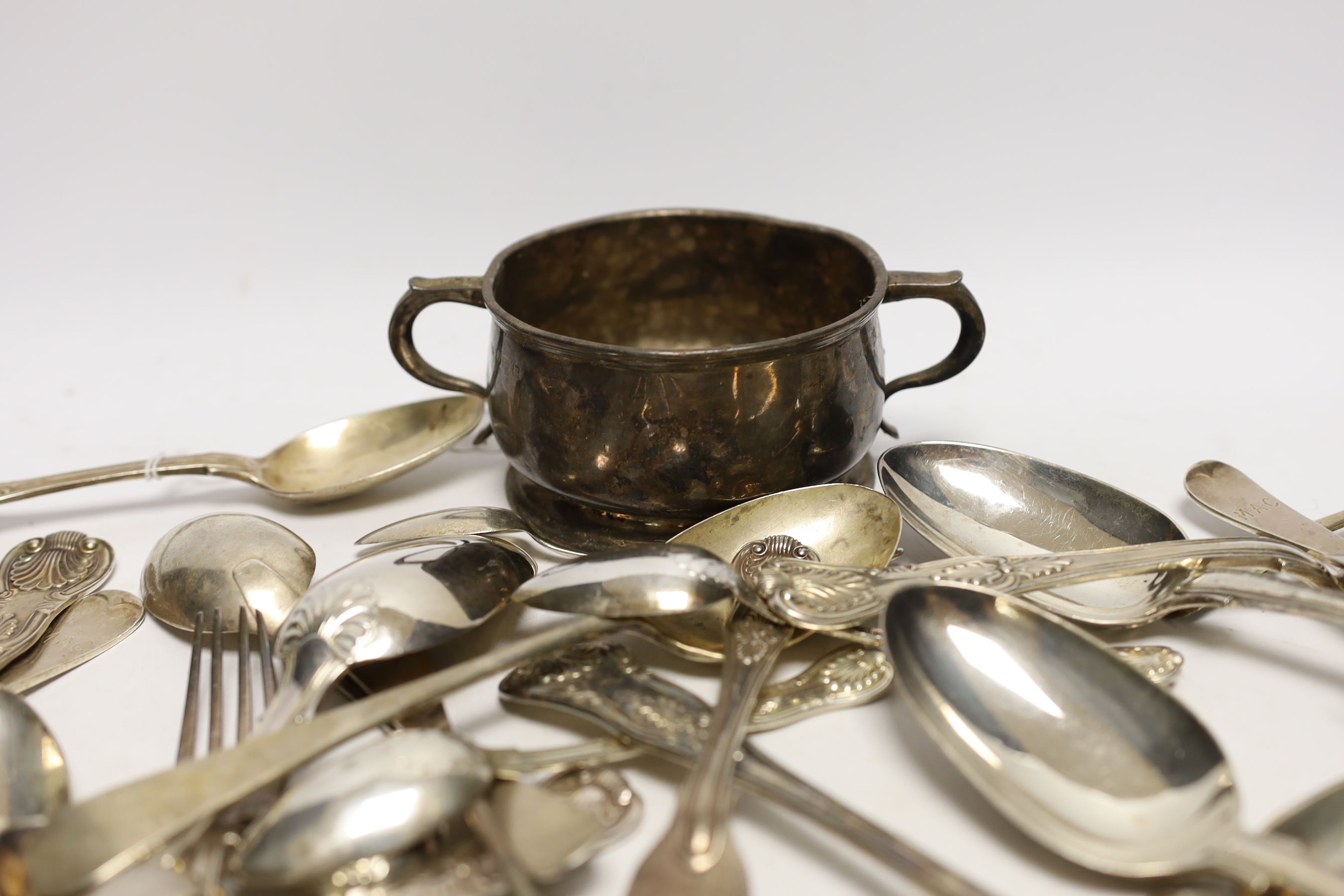 A quantity of assorted 19th century silver flatware, various pattern, dates and makers, together with a George V two handled bowl, 89.5oz.